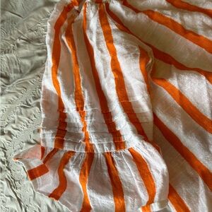 Orange and white summer top.